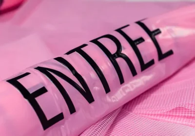 Sas d'entrée gonflable rose en matériau souple personnalisé